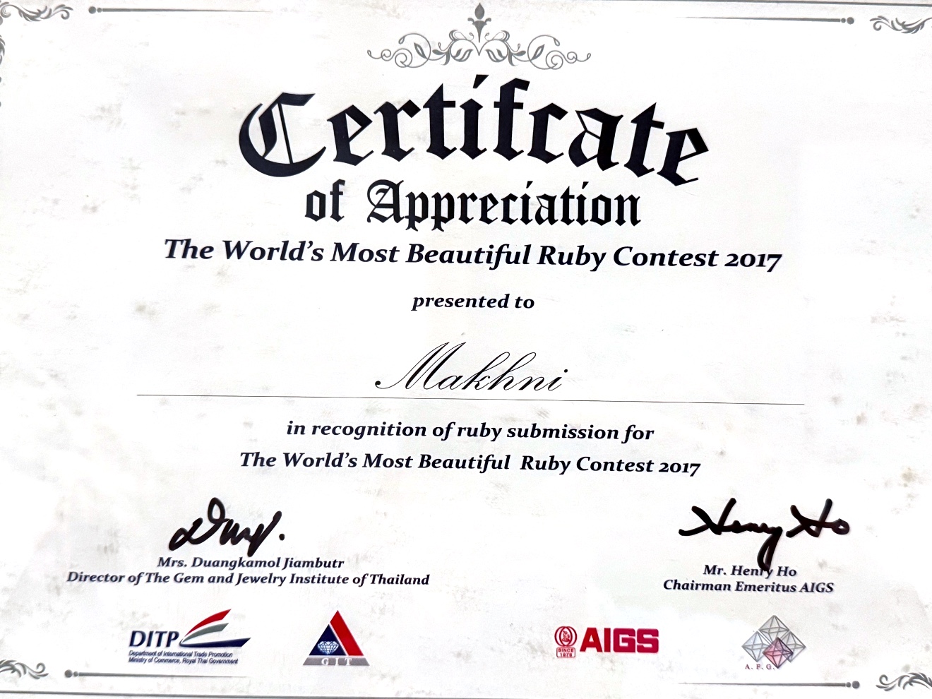 AIGS Certificate of Appreciation presented to Makhni for The World's Most Beautiful Ruby Contest 2017