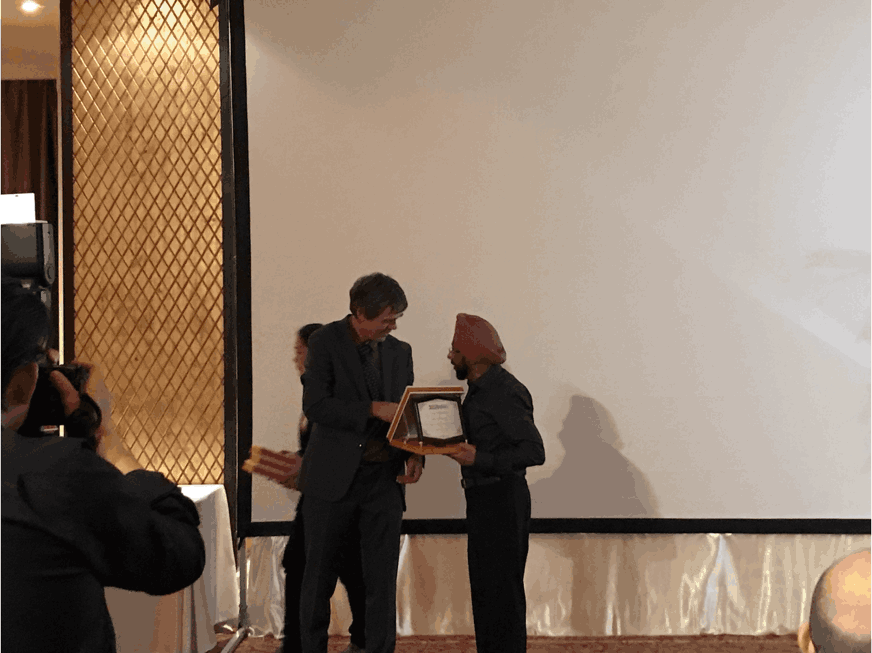 Mr. Parambir Makhni receiving the Award of Excellence from GRS GemResearch Swisslab